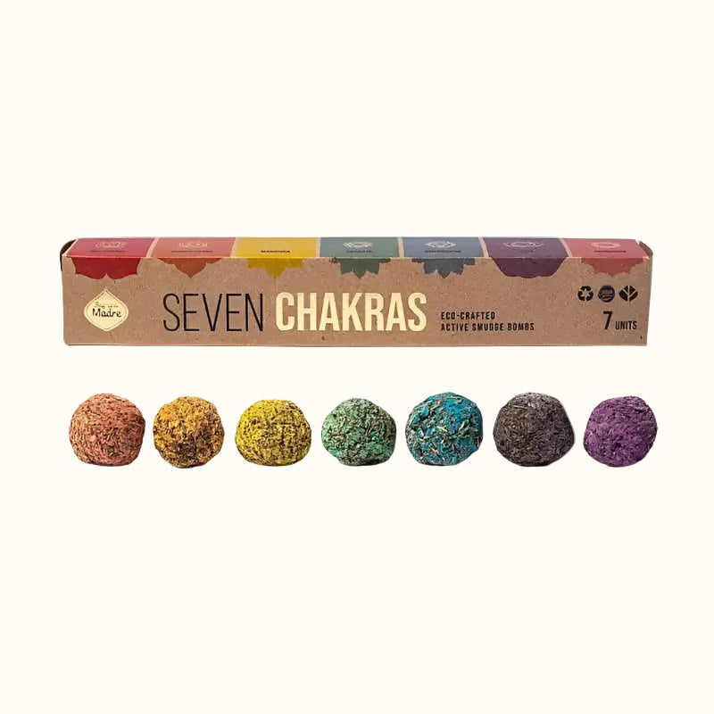 A set of seven colorful smudge bombs labeled for each of the seven chakras, made by Sagrada Madre.