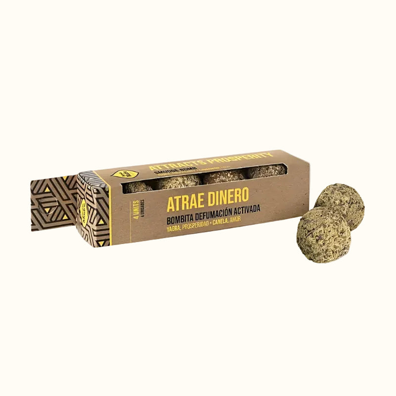 Sagrada Madre premium smudge bombs labeled 'Atrae Dinero'.